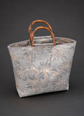 The Lana tote bag in silver by British Retro, a glamorous everyday handbag