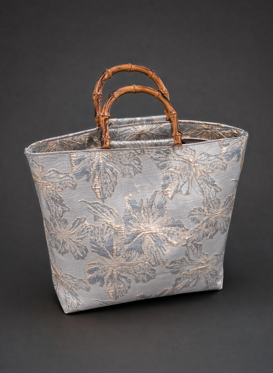 The Lana tote bag in silver by British Retro, a glamorous everyday handbag