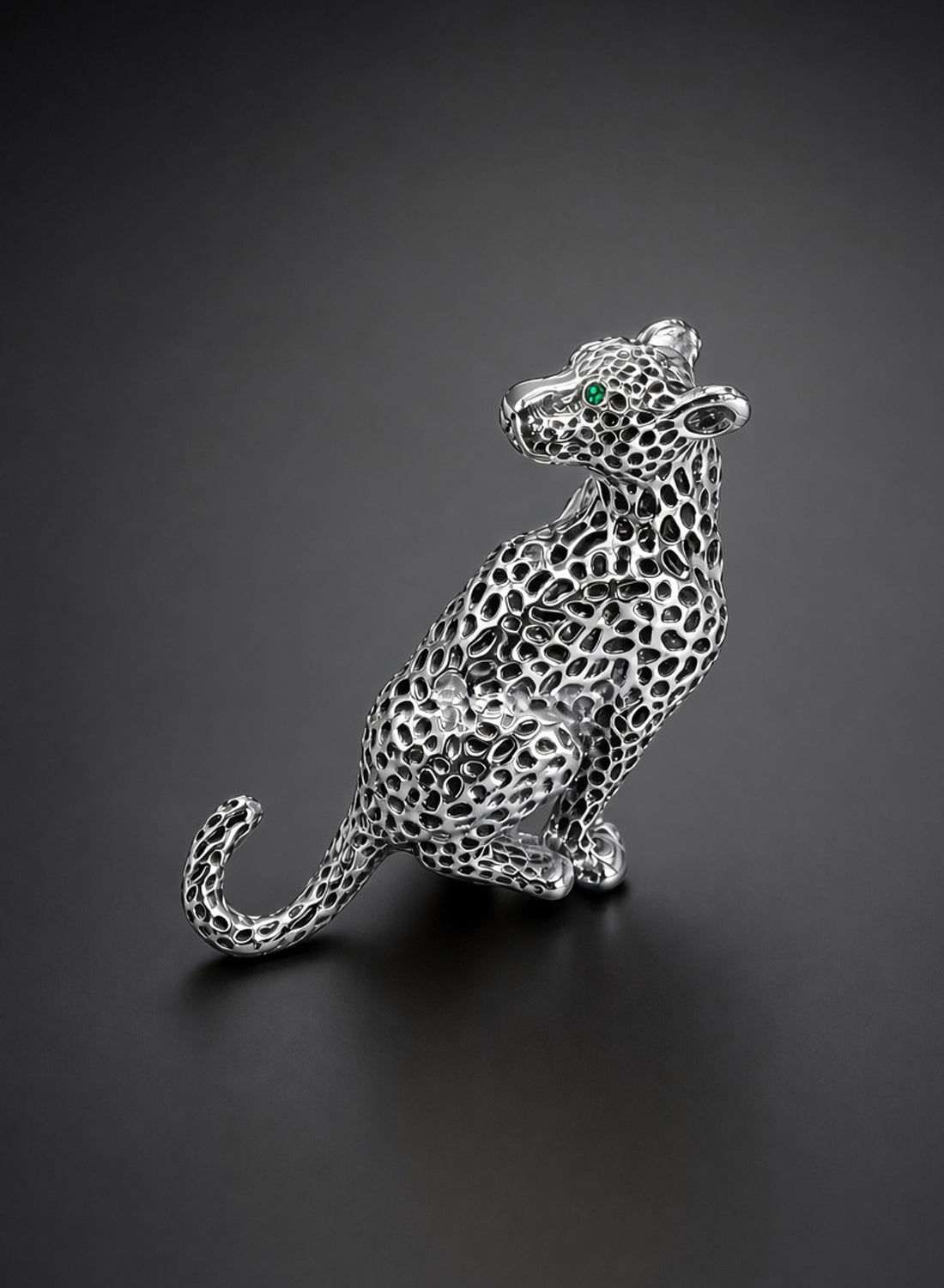 The Dietrich silver leopard brooch with emerald crystal eyes, an Old Hollywood style lapel brooch