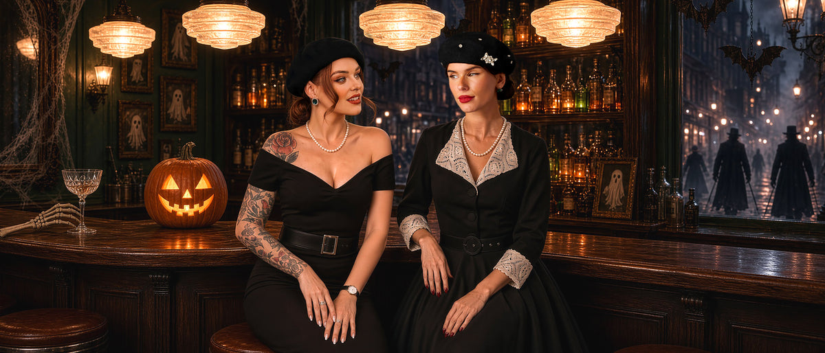 Two women in 1950s style black dresses and berets at a vintage Halloween bar – British Retro
