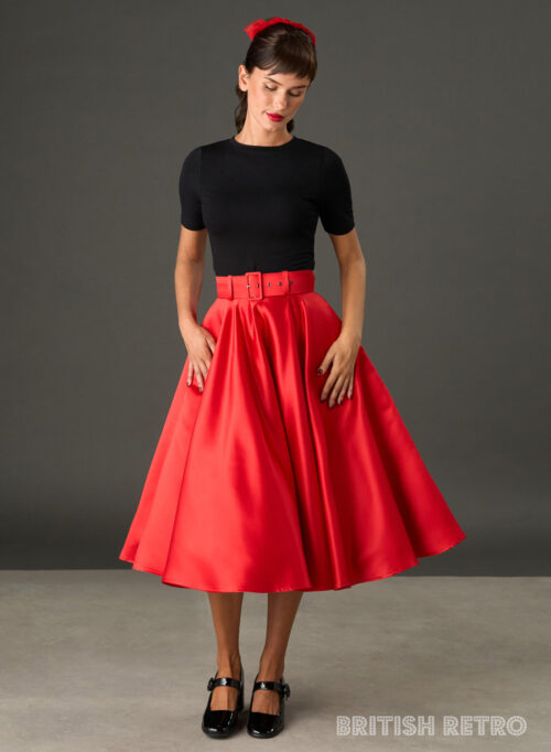 Woman wearing The Grace red satin full circle midi skirt with matching belt and pockets