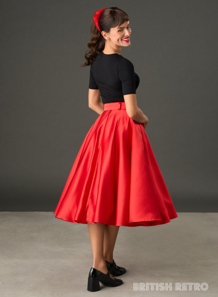 Woman wearing The Grace red satin full circle midi skirt with matching belt and pockets