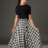 Woman wearing The Eloise black and white gingham full circle midi skirt with matching belt