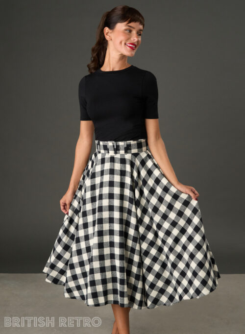 Woman wearing The Eloise black and white gingham full circle midi skirt with matching belt