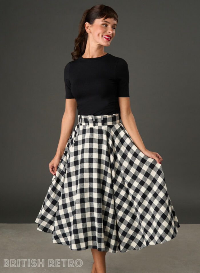 Woman wearing The Eloise black and white gingham full circle midi skirt with matching belt
